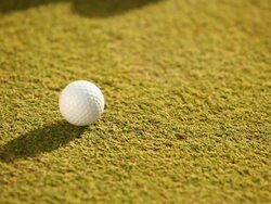 Golf club hitting a ball  Stock Footage