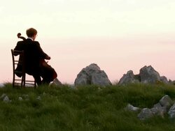 CRANE: Playing Cello Outdoors Stock Footage