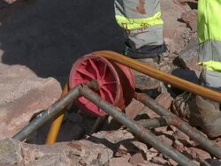 CU Worker preparing blasting operation at quarry / Taben-Rodt, Rhineland-Palatinate, Germany Stock Footage