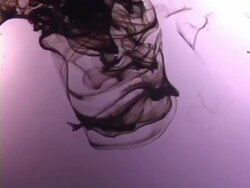 CU, Black ink dissolving in water Stock Footage