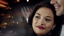 Glamorous celebrity couple pose for the cameras at awards show Stock Footage