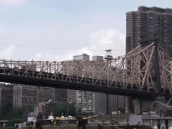 Roosvelt Island Tram crossing East River Stock Footage