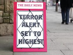 Newspaper Headline Board - Terror alert set to highest Stock Footage
