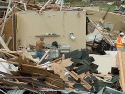Widespread Damage And Casualties After Tornadoes Rip Through South Stock Footage