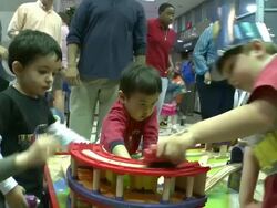 ATMOSPHERE - kids play at Amtrak National Train Day 2013 - Washington D.C. Stock Footage