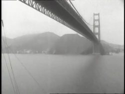Uniformed members of the WAVES stand in the shape of an anchor on an aircraft carrier in San Francisco. News Clip