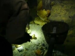MS Miners collecting solid sulfur from inside the volcano at night / Ijen, Java, Indonesia Stock Footage