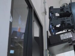 MS PAN 3D cinema projector with stereo image splitter attachment in theater multiplex Stock Footage