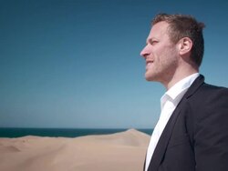 Businessman in desert Stock Footage