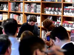 Juanes greets fans and signs copies of his book Stock Footage