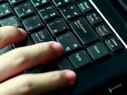 Typing fingers push notebook.Enter Stock Footage