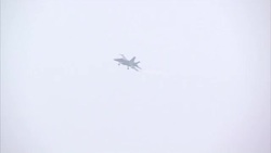 US Fighter Jets landing on USS Carl Vinson News Clip