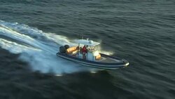 A powerboat speeds across Narragansett Bay. Stock Footage