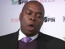 INTERVIEW - John Wallace talks about how he thinks Topspin is a great cause, his favorite teacher was in math and how she made math fun Stock Footage