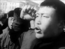 B/W 1960s close up Chinese man shouting + raising fist during demonstration / China / educational Stock Footage