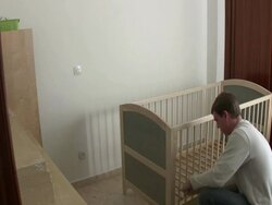 Putting together a crib Stock Footage