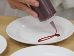 MS Decorating plate then placed piece of cake on top  / Seattle, Washington, United States  Stock Footage