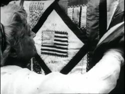 Woman makes quilt for General Pershing Stock Footage