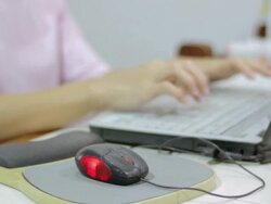 Working at home with laptop mouse, close-up Stock Footage