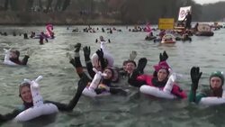 CLEAN : 2000 people swim in Germany's cold Danube river News Clip