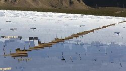 The Ivanpah Solar Thermal Power Plant in California''s Mojave Desert is currently the largest solar thermal plant in the world. It generates 392 megawatts (MW) and deploys 173,500 heliostats that reflect the suns rays onto three solar towers. It covers 4,0 Stock Footage