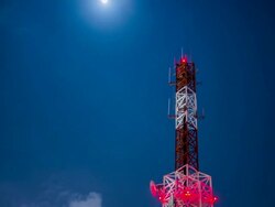 Antenna broadcast TV signal on sky and moon at night background Stock Footage