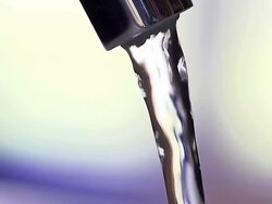 MS Shot of Tap with Running Water / Vieux, Pont, Normandy France Stock Footage