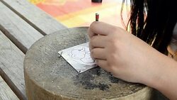 Silver art handicrafts of Lanna, Thai style, Chiang Mai, Thailand, hand banging on silver with a hammer. Stock Footage