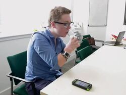 Mid shot Patrick demonstrates how he can grab Stock Footage