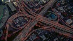 The Harbor Freeway (Interstate 110) and the Santa Monica Freeway (Interstate 10) intersect in a partial cloverleaf stack interchange in Los Angeles. Stock Footage