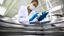 Medical scientist 'examining drugs' Stock Footage