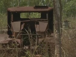 Military vehicle rusts in outback, Australia Stock Footage