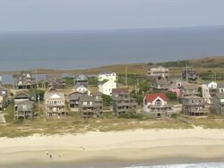MS AERIAL Shot of beach house on Cape Hatteras National Seashore / North Carolina, United States Stock Footage