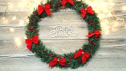 Christmas wreath with decorations on the shabby wooden background Stock Footage