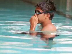 Swimmer practice and relax Stock Footage