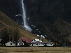 WS View of Residence area in front of waterfall / Iceland  Stock Footage