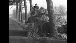 US troops camouflage their tanks and vehicles on the Western Front during World War II News Clip