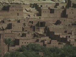 Moroccan hillside houses. Doors and windows seemingly built into the landscape. Stock Footage