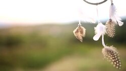 Dream catcher against the rising sun Stock Footage