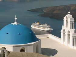 MS Shot of church in Firostefani with cruise ship in Ocean / Santorini, Cyclades, Greece Stock Footage