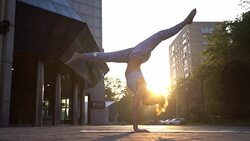 Young Woman Doing Yoga Meditation Exercises at Sunset Stock Footage