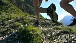 HD Super Slow-Mo: Extreme Athletes Running Uphill Stock Footage