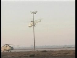 Inspectors depart in helicopters, plus women in military parade News Clip