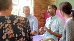 Man talking in group therapy session Stock Footage