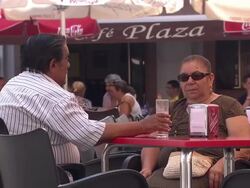 Tourists and residents relaxing in La Linea, Spain News Clip