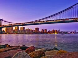 Stones, river, bridge and city Stock Footage