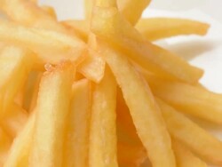 Close up of rotating french Fries Stock Footage