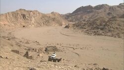 Ruins line a wadi near an abandoned emerald mine in Sikait, Egypt. Stock Footage
