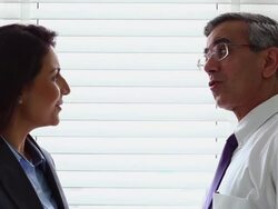 Two Business people talking  Stock Footage