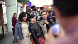 Friends pose for picture in downtown Las Vegas Stock Footage
